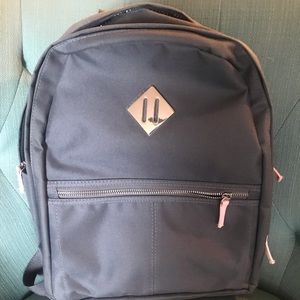 Gray and pink backpack